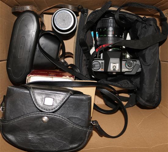 Two Practica cameras, Pentax camera, two 135mm lenses and a case
